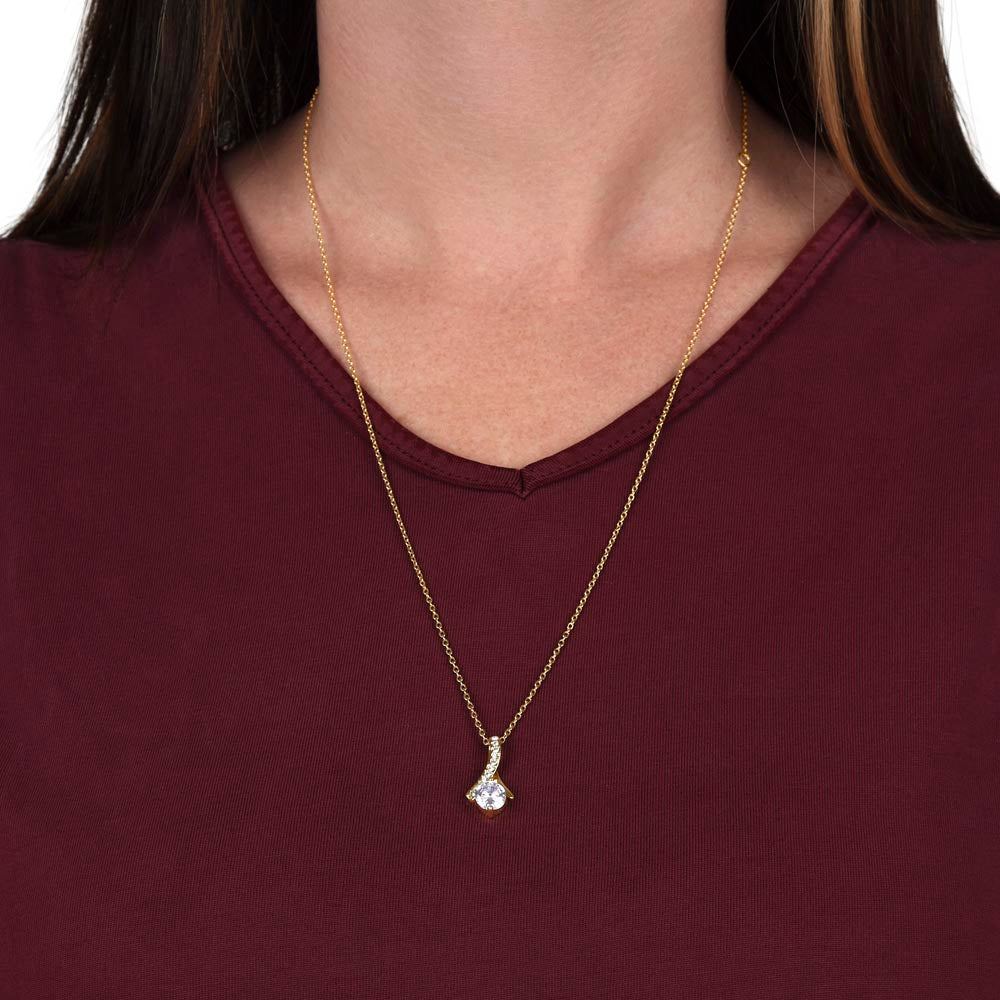 An exquisite symbol of love and grace; The "Love Knot Necklace"