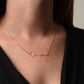Shine a light on her success with this "Signature Name Necklace"